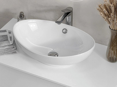 Раковина накладная на столешницу 57 см Velvex 7027A овальная